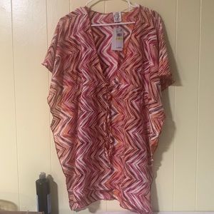 BECCA  tunic new size M/L